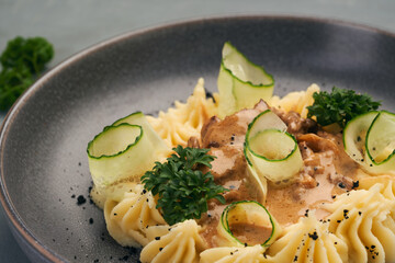 food mashed potatoes with meat and gravy cucumber and parsley