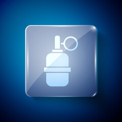 White Hand grenade icon isolated on blue background. Bomb explosion. Square glass panels. Vector.