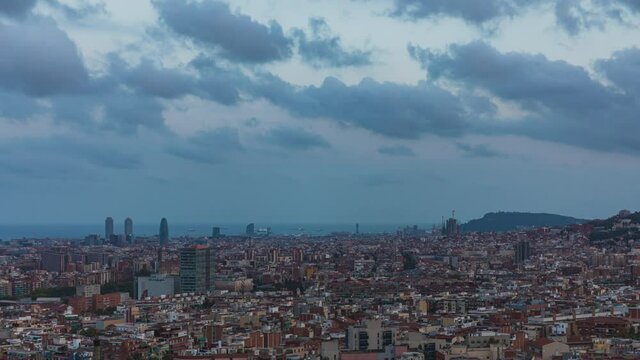 Timelapse of sunset over Barcelona city skyline