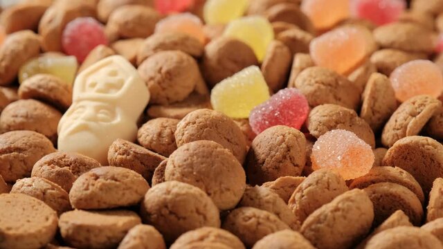 Rotation of kruidnoten, traditional sweets, strooigoed. Background for Dutch holiday Sinterklaas. St. Nicolas day concept. 4K video, 50 fps