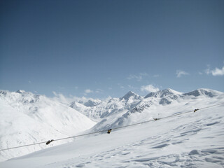 Fototapeta na wymiar snow white winter piste in the northern alps under blue sky