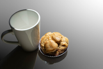 a cup of  warm drink  with a snack, coffee break 