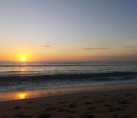 Fototapeta na wymiar golden sunset sky on the beach