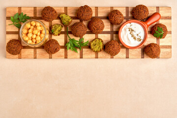 Falafel balls on wooden board. Top view