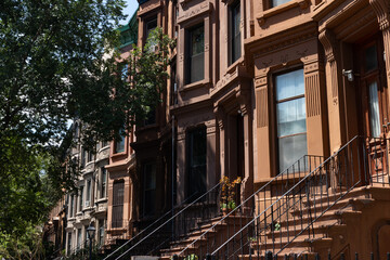 Row of Old Brownstone Homes in Clinton Hill in Brooklyn of New York City with Staircases