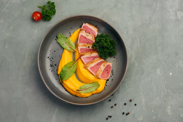 food tuna and mashed pumpkin