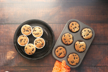 Top view of women hand holding chocolate pan cake.