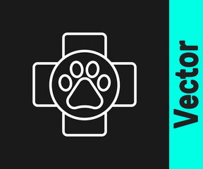 Fototapeta premium White line Veterinary clinic symbol icon isolated on black background. Cross hospital sign. A stylized paw print dog or cat. Pet First Aid sign. Vector.
