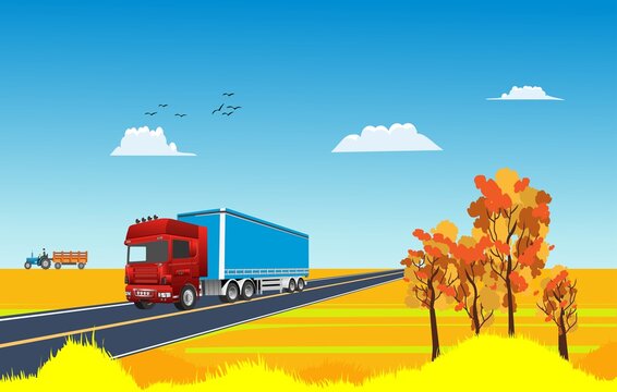 Truck drives on the highway, in gold countryside landscape, autumn season landscape vector