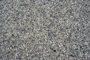  Tiny gravel texture on grey concrete wall. Texture background seamless gravel floor.