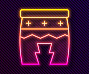 Glowing neon line Musical instrument huehuetl icon isolated on black background. Vector.