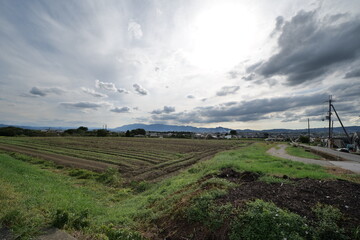 A view of a village deep in the mountains taken on a sunny day in the middle of summer
