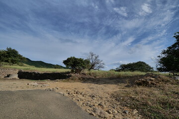 A view of a village deep in the mountains taken on a sunny day in the middle of summer