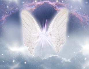 beautiful angel archangel wings with star over angelic divine background with galaxy like spiritual...