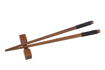 Wooden chopsticks with holder isolated on white background, Japanese style