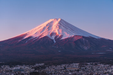 Fototapeta premium Close up fujisan mountain landscape view in sunrise light reflection above the crest of the Mountain crater.Japan natural landscape background
