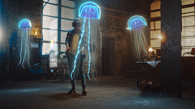 Female Artist Wearing Augmented Reality Headset Working on Abstract 3D Jellyfish Sculpture with Joysticks, Uses Gestures To Create High-Tech Internet Multimedia Concept Art.3D Animation Special Effect