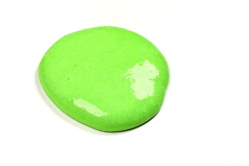 green slime toy on white background