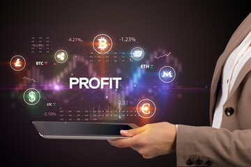 Close-up of a touchscreen with PROFIT inscription, business opportunity concept