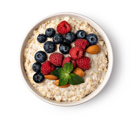 prepared oatmeal with berries and nuts