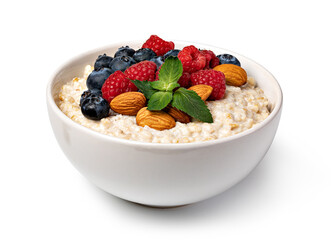prepared oatmeal with berries and nuts