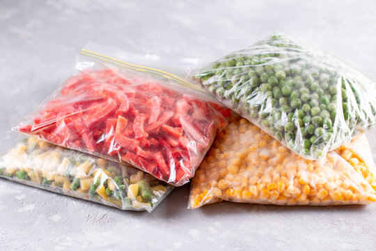 Plastic bags with different frozen vegetables