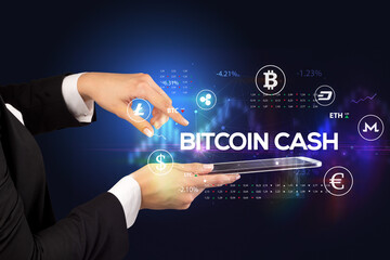 Close-up of a touchscreen with BITCOIN CASH inscription, business opportunity concept