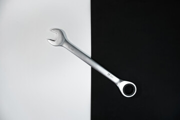 Wrench for car repair on a black-white background. 18mm spanner

