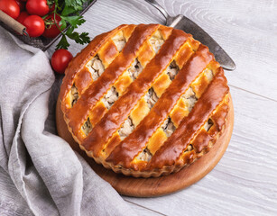 Yummy  delicious homemade pie tart with chicken, close up, round