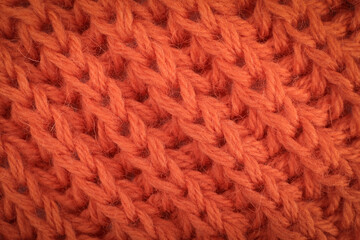 Close-up knitted wool pattern, soft focus. Airy red wool yarn. Diagonal arrangement. Copy space