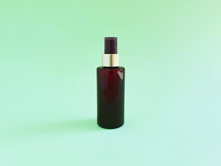 Mockup of unbranded brown plastic spray bottle on green background. Cosmetic bottle container for branding of medicine or cosmetics. Natural organic spa Body mist. Trendy shadow