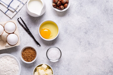Fototapeta na wymiar Ingredients for baking - flour, milk, salt, sugar, eggs.