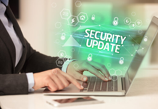 SECURITY UPDATE inscription on laptop, internet security and data protection concept, blockchain and cybersecurity