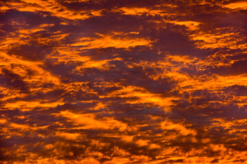 Fiery beautiful clouds at sunrise