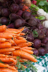 carrots and beets in a market - 378982300