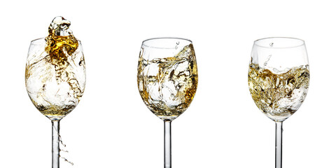 Set of three glasses with a splash of white wine