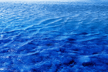 Photo background of blue transparent sea water