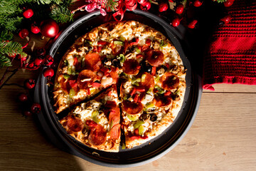 overhead view of a whole Christmas pizza as a treat for Santa Claus