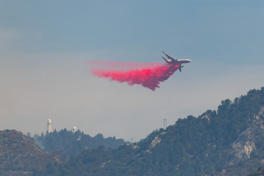 DC-10 Tanker making a Phos-Chek drop in front of Mt. Wilson