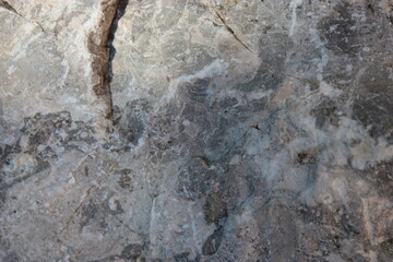 Texture of stone walls with cracks to use for the background.