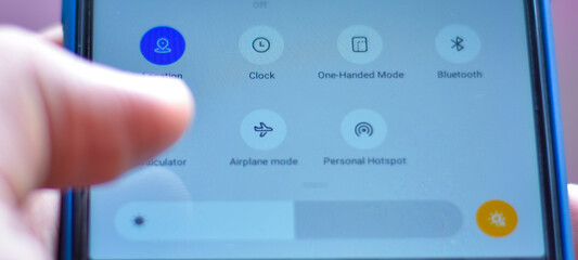 mobility and modern lifestyle concept: human checking to click do do not disturb option © RK