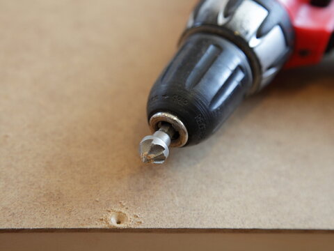 Countersink bit for electric drill, countersinking of screw holes with a cone head