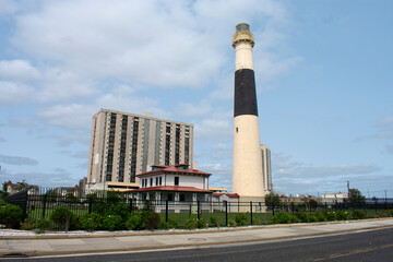 Fototapeta na wymiar View of Absecon Lighthouse and tower in Atlantic City, New Jersey, on a partially cloudy day. -02