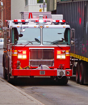 New York City fire department NYFD truck on the street in Manhattan in bright red