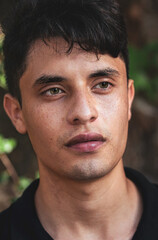 Obraz premium Portrait of boy in the woods