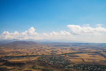 Beautiful panoramic aerial view of the mountains and fields.