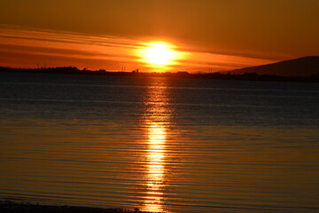 Sunset over the sea page and beautiful colors