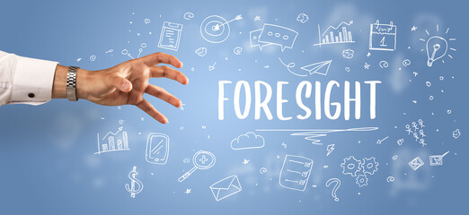 Close-Up of cropped hand pointing at FORESIGHT inscription, modern business solution concept