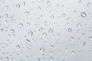 Water droplets on the glass in the rain. Water rain drop on window glasses