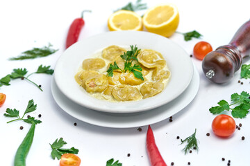 Italian ravioli pasta with meat or fish on white background